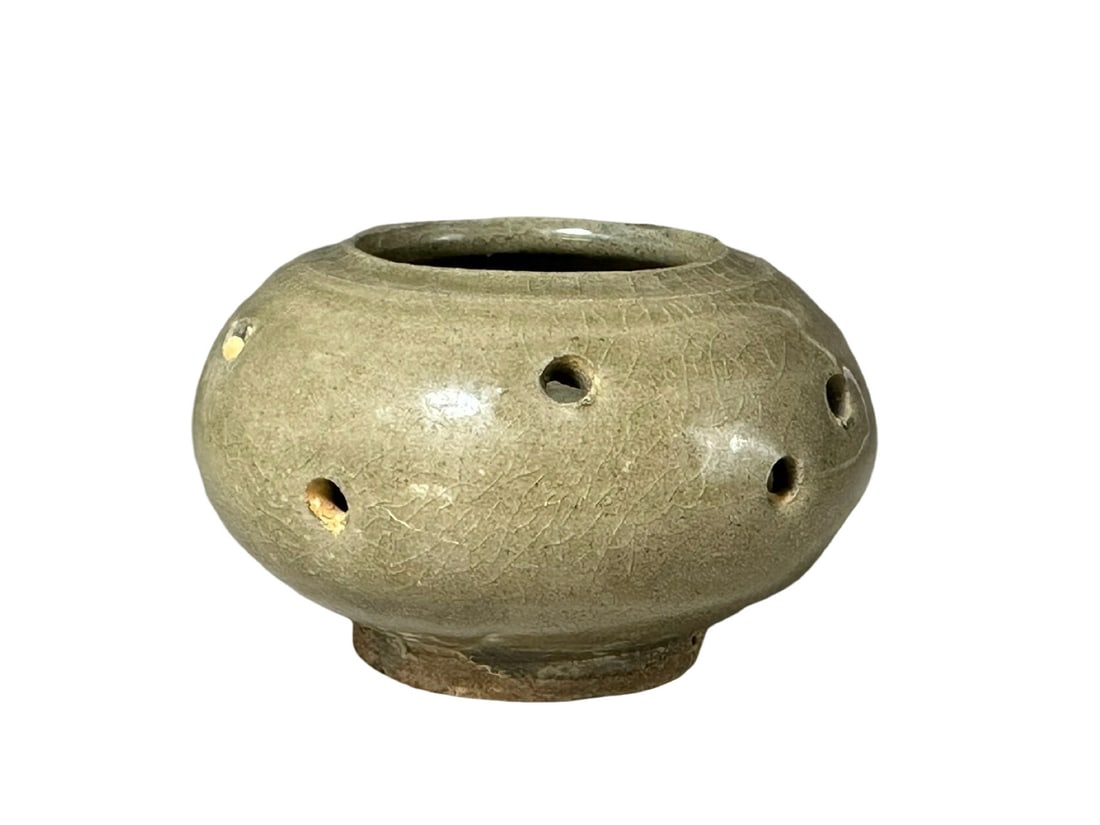 Longquan Celadon Perforated Miniature Censer, Yuan-Ming Transition Period: Longquan Celadon Perforated Miniature Censer, Yuan-Ming Transitional PeriodDimensions: Diameter 7.7 cm (3.03 inches), Height 4.7 cm (1.85 inches)Condition: Perfect intact with no restorationObject Ove