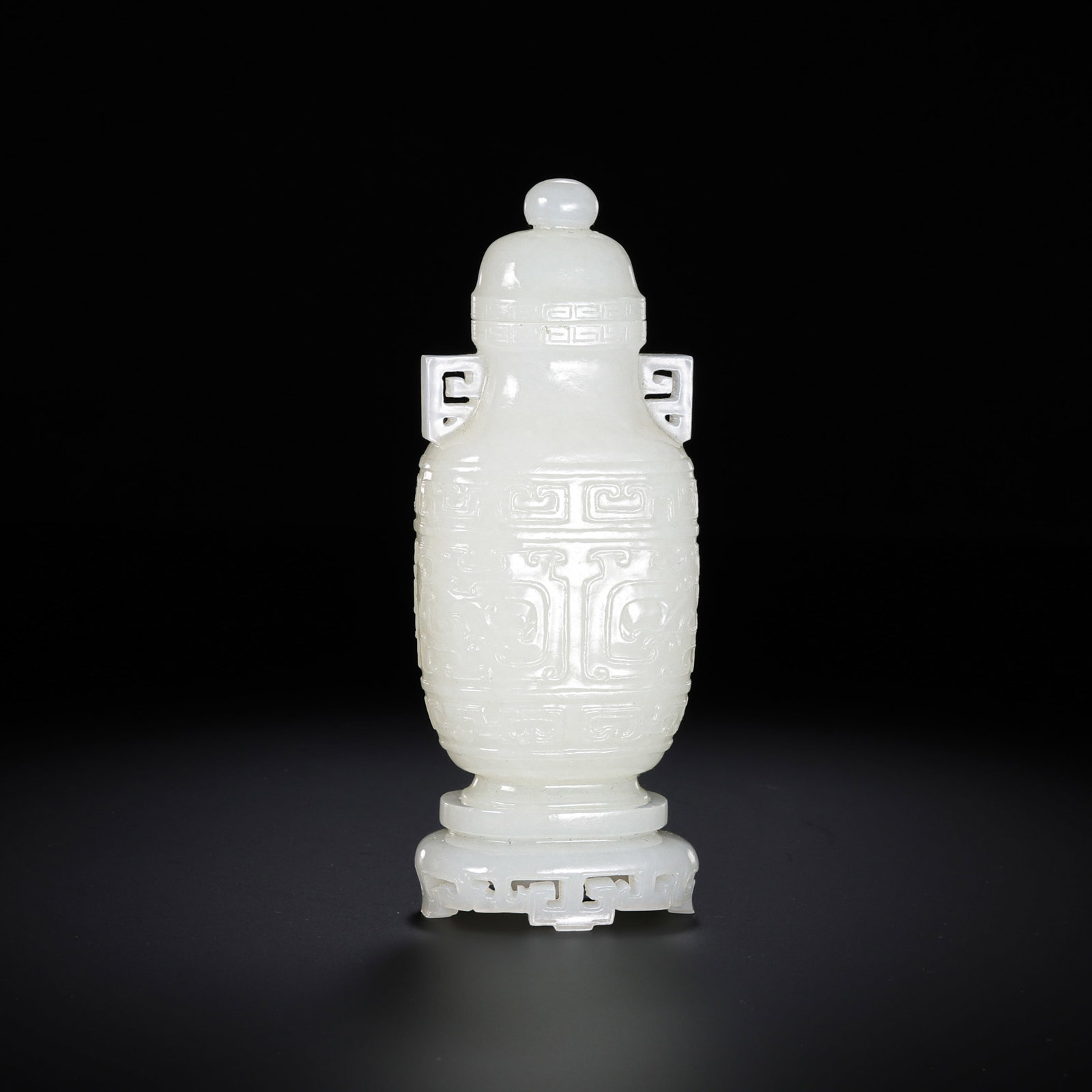 Chinese Qing Dynasty Hetian white jade double-eared vase with animal mask design. (1 of 9)