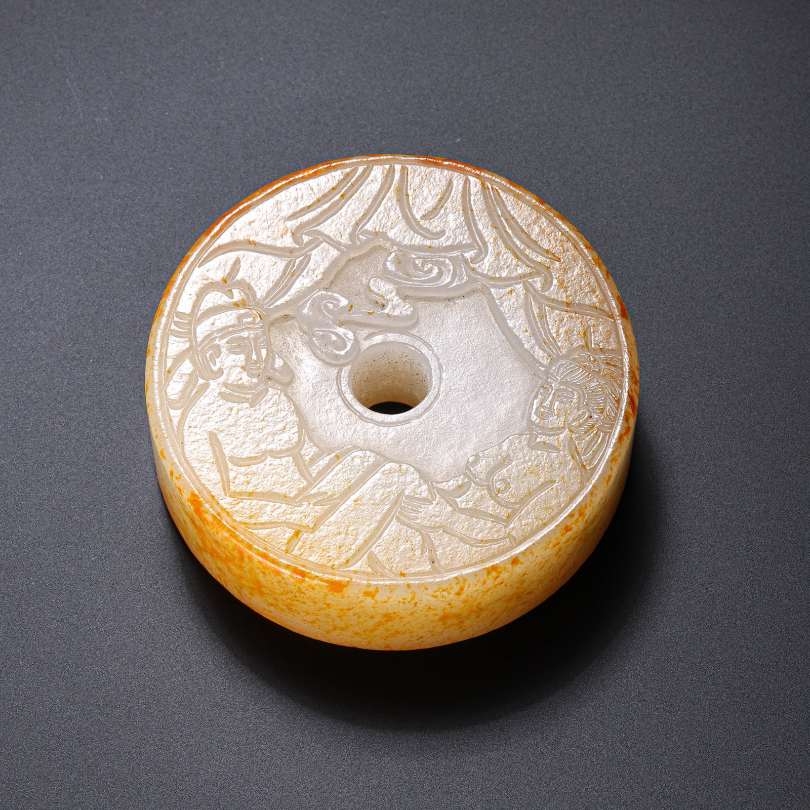 Chinese Qing Dynasty Hetian jade carving of figures and stories on a safety buckle.: Diam . 5.5 cm . Weight 114 gram .