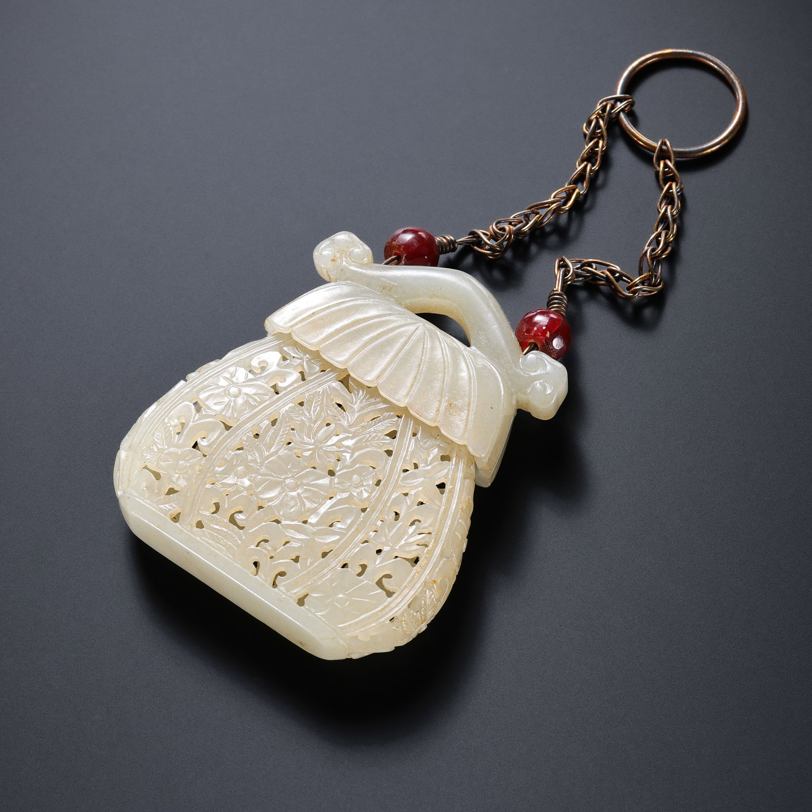 Chinese Liao Dynasty carved sachet: H . 6 cm . L . 5.2 cm . Weight 42 gram .