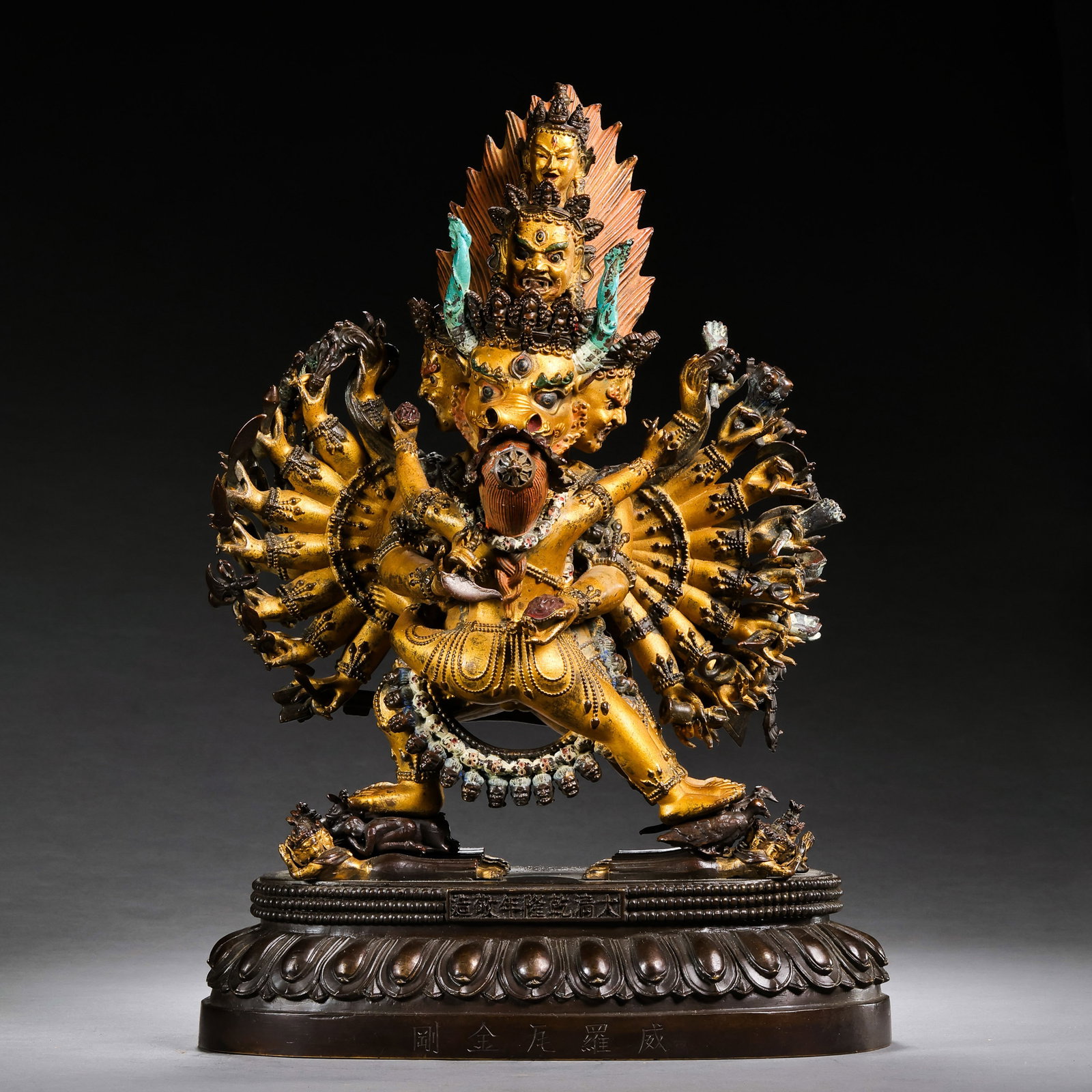 A partially gilt bronze Buddhist statue from the Qianlong period of the Qing Dynasty in China.: H . 29.5 cm . L . 20 cm . Weight 5995 gram .