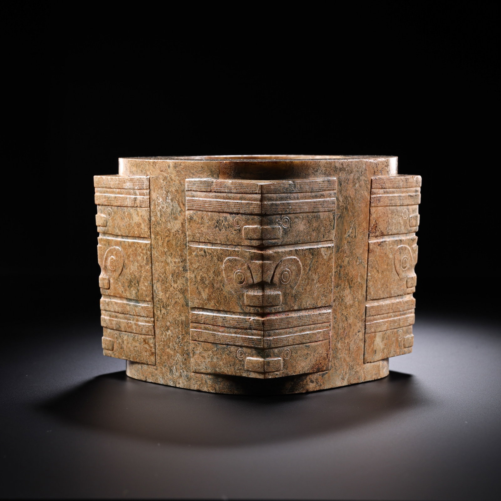 Jade Cong with Beast-Face Pattern from the Han Dynasty in China: H . 10.7 cm . L . 12.5 cm . Weight 2689 gram .