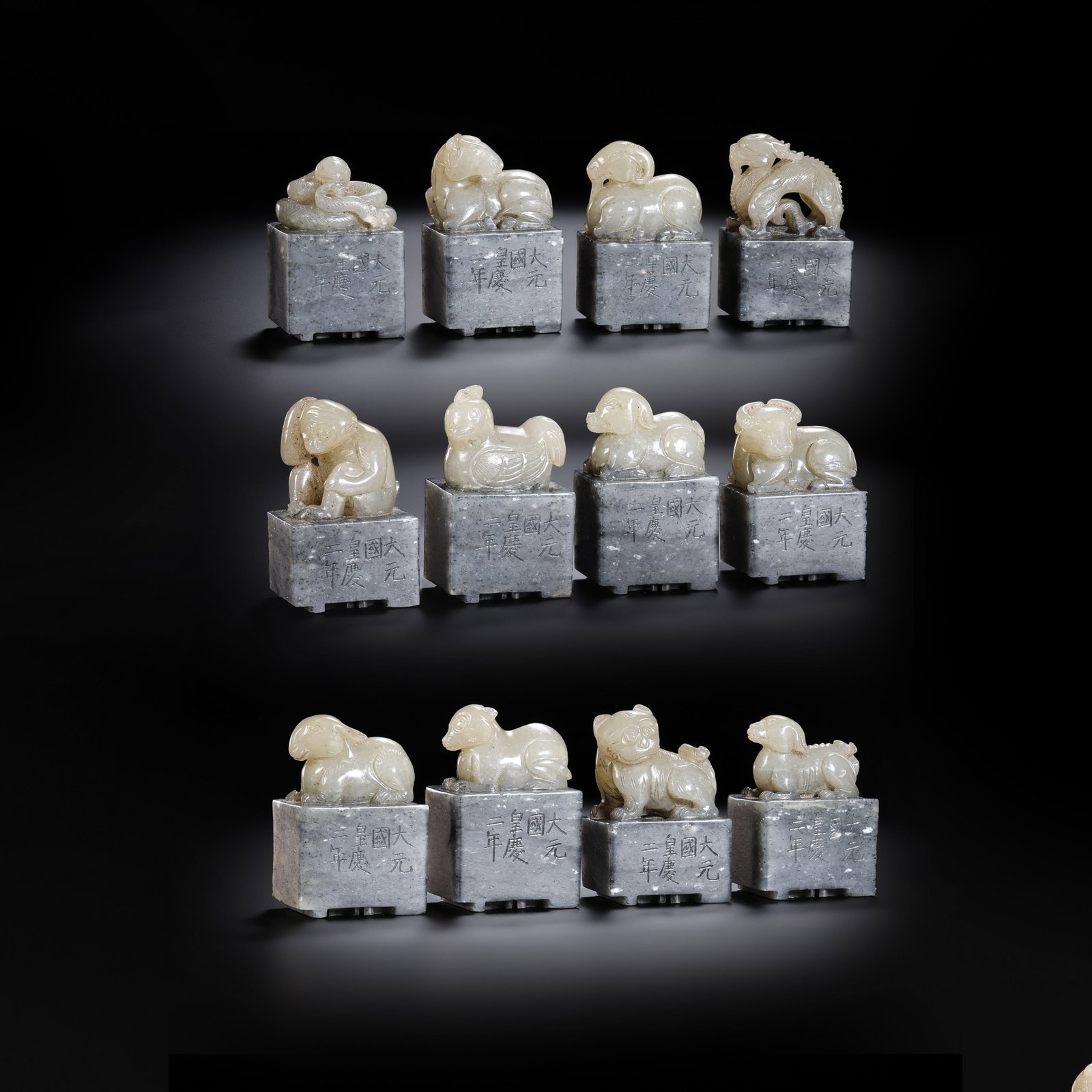 A set of twelve Chinese zodiac animal seals from the Yuan Dynasty: L . 3 cm . H . 4.5 cm . L . 2.7 cm . H . 4 cm . Weight 630 gram .