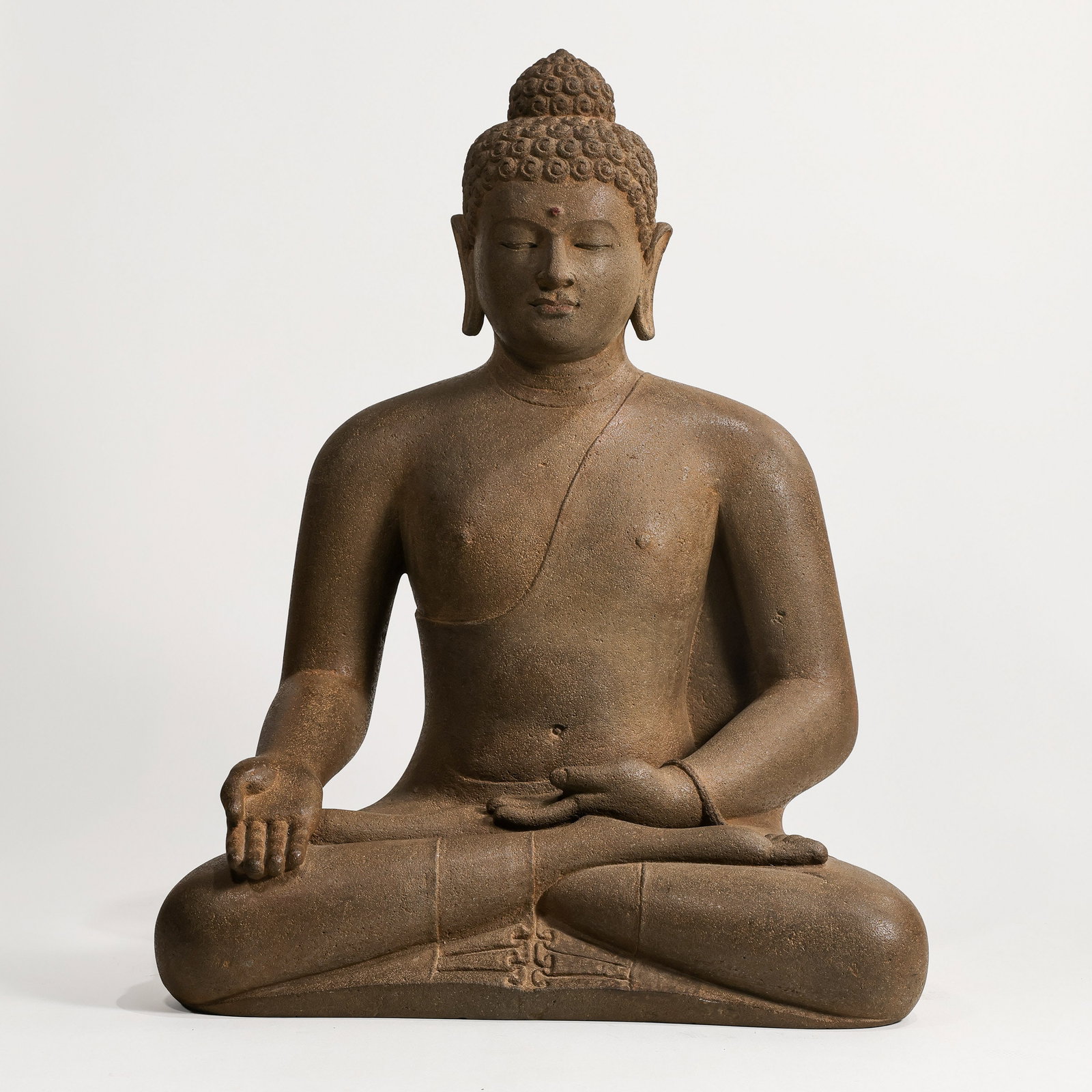 2nd century AD Gandhara bluestone seated Buddha statue: H . 68.5 cm . L . 50 cm .