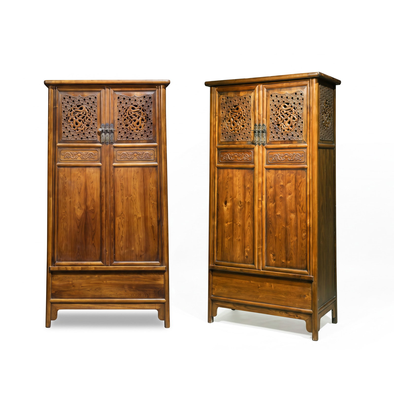 A pair of Chinese Qing Dynasty huanghuali wood cabinets: H . 180 cm . W . 42 cm . L . 89 cm .