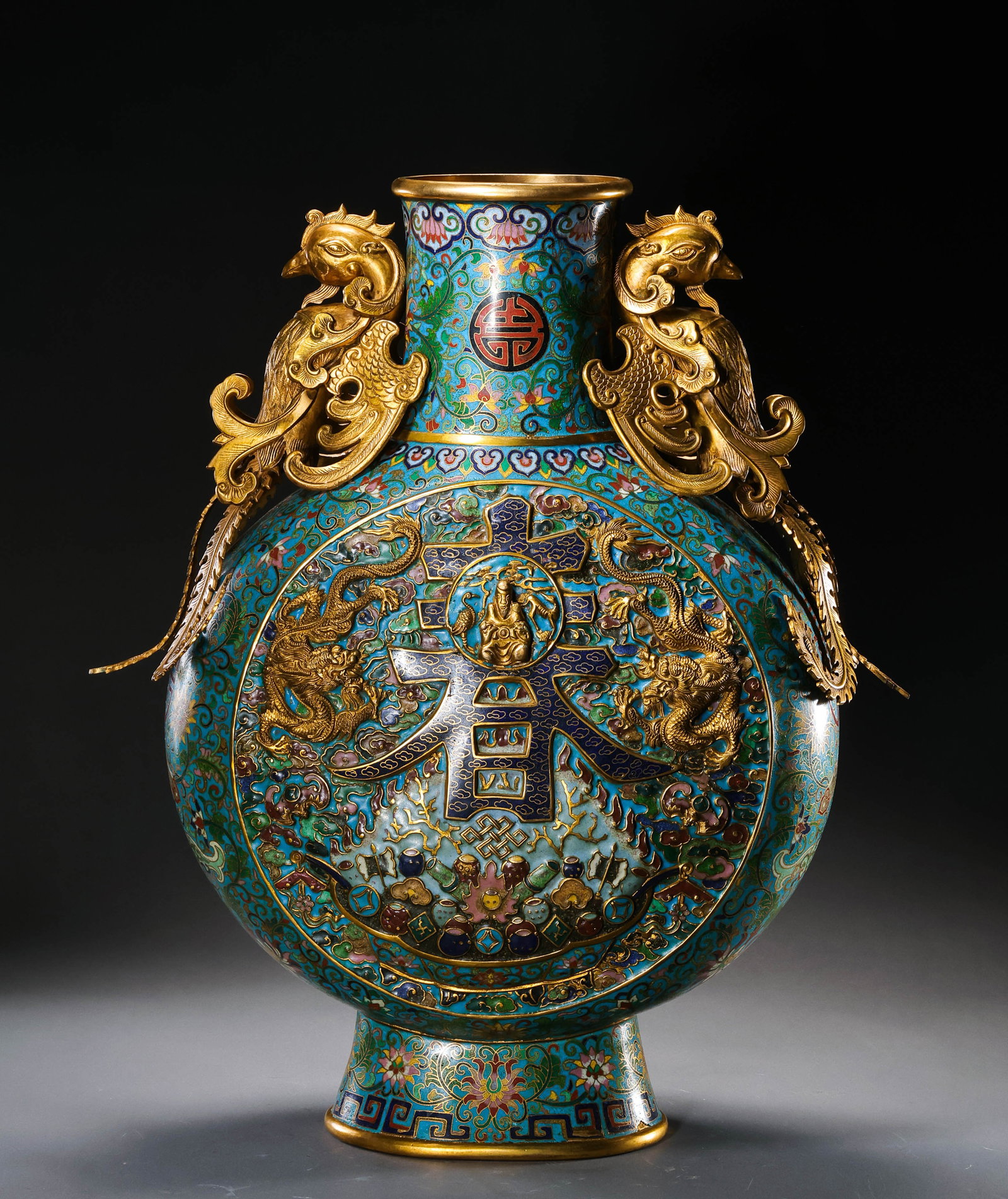 Cloisonné enamel flat bottle with phoenix handles from the Qianlong period of the Qing Dynasty,: H . 50 cm . L . 44 cm . Weight 6469 gram .