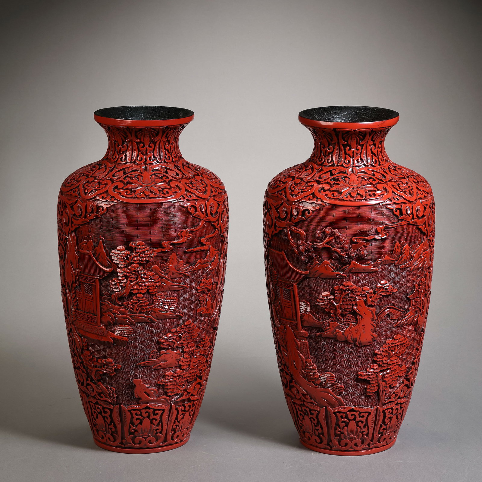 A pair of Chinese carved lacquer vases with landscape and story designs from the Qianlong period of (1 of 12)