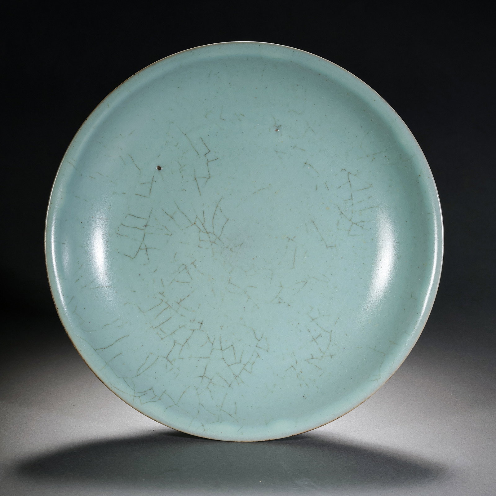 Chinese Song Dynasty Ru Kiln Celadon Plate: H . 3.3 cm . Diam . 18.7 cm .
