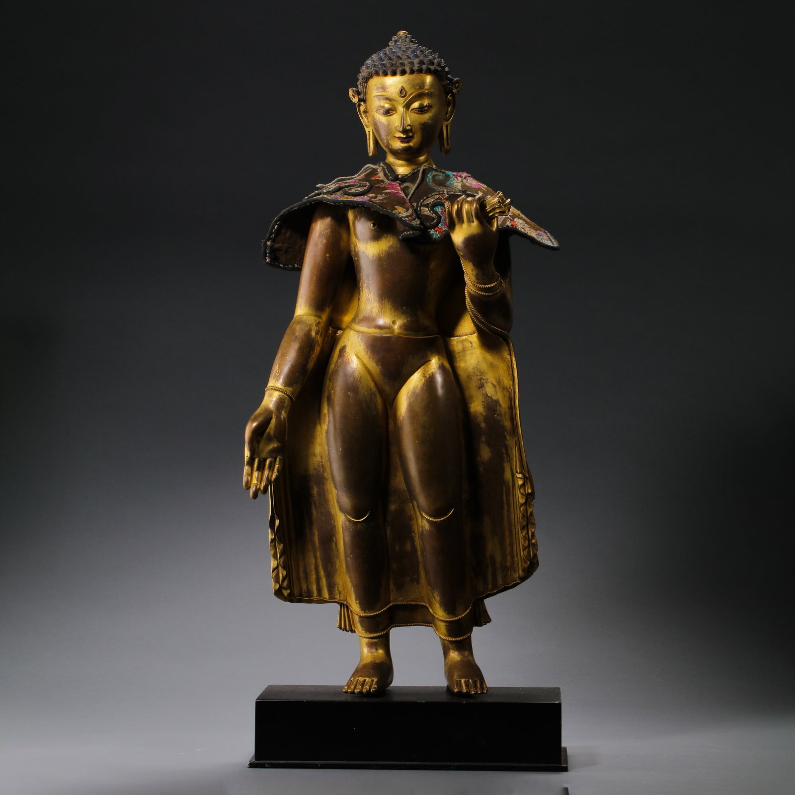 Chinese Ming Dynasty Gilt Bronze Standing Buddha Statue: H . 64 cm . L . 23.5 cm . Weight 12300 gram .
