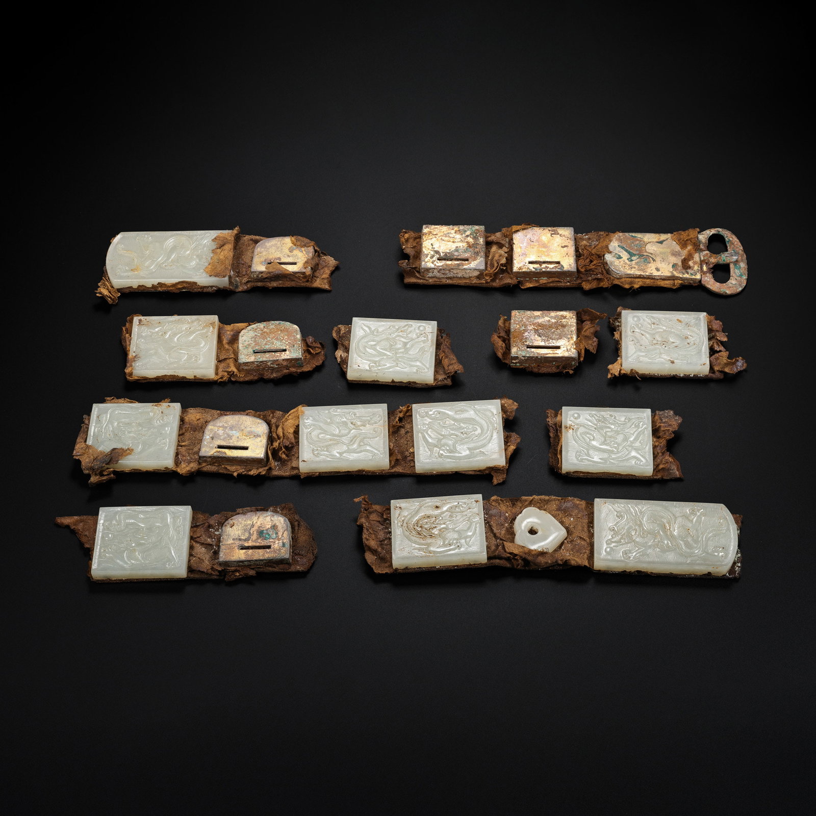 A set of Hetian white jade belt plaques from the Liao Dynasty, China: L . 9 cm . L . 5.2 cm . L . 7.8 cm . W . 1260 gram .