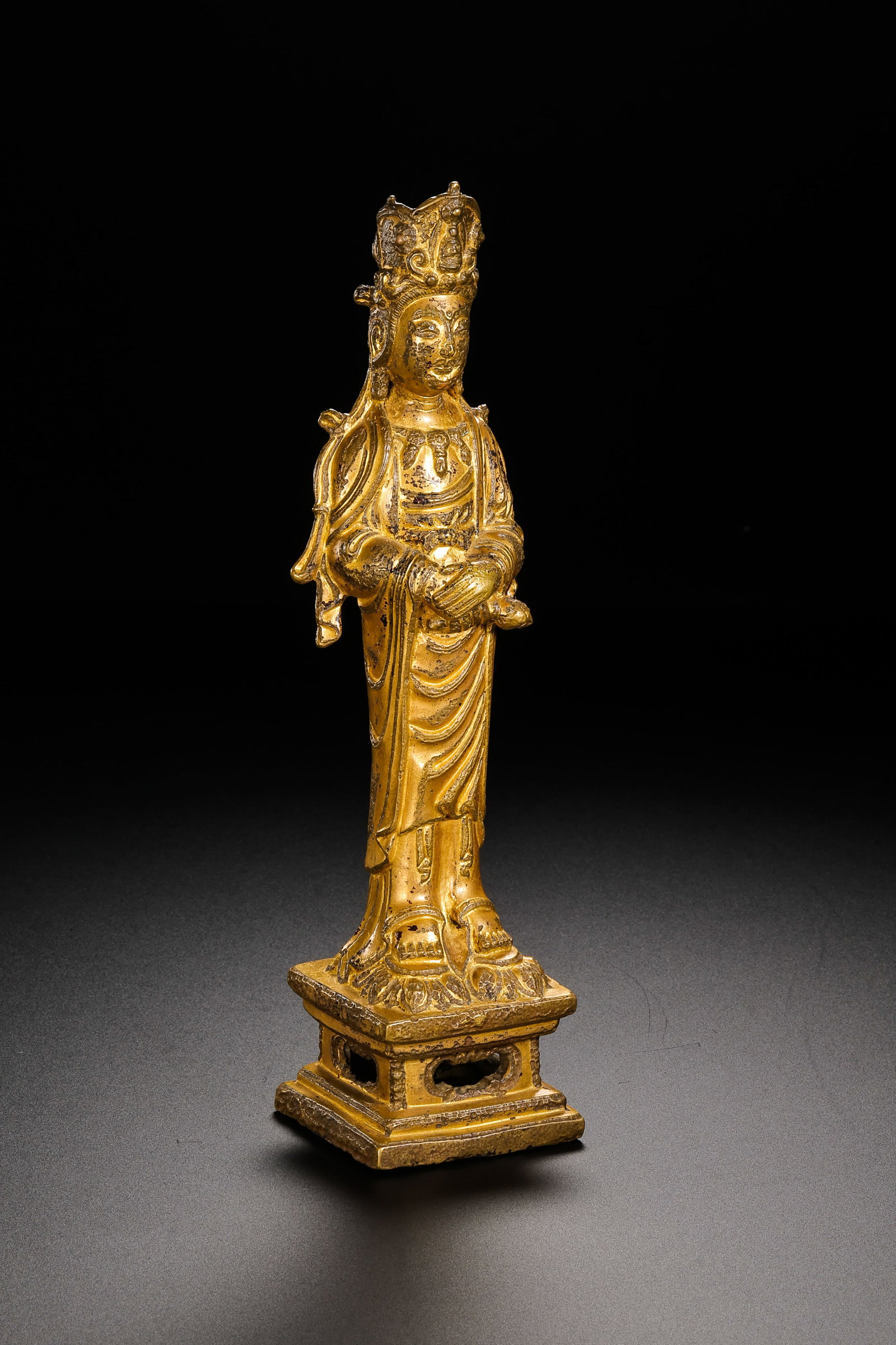 Gilt Bronze Standing Buddha Statue from the Liao Dynasty in China: H . 20 cm . L . 5.5 cm . Weight 547 gram .