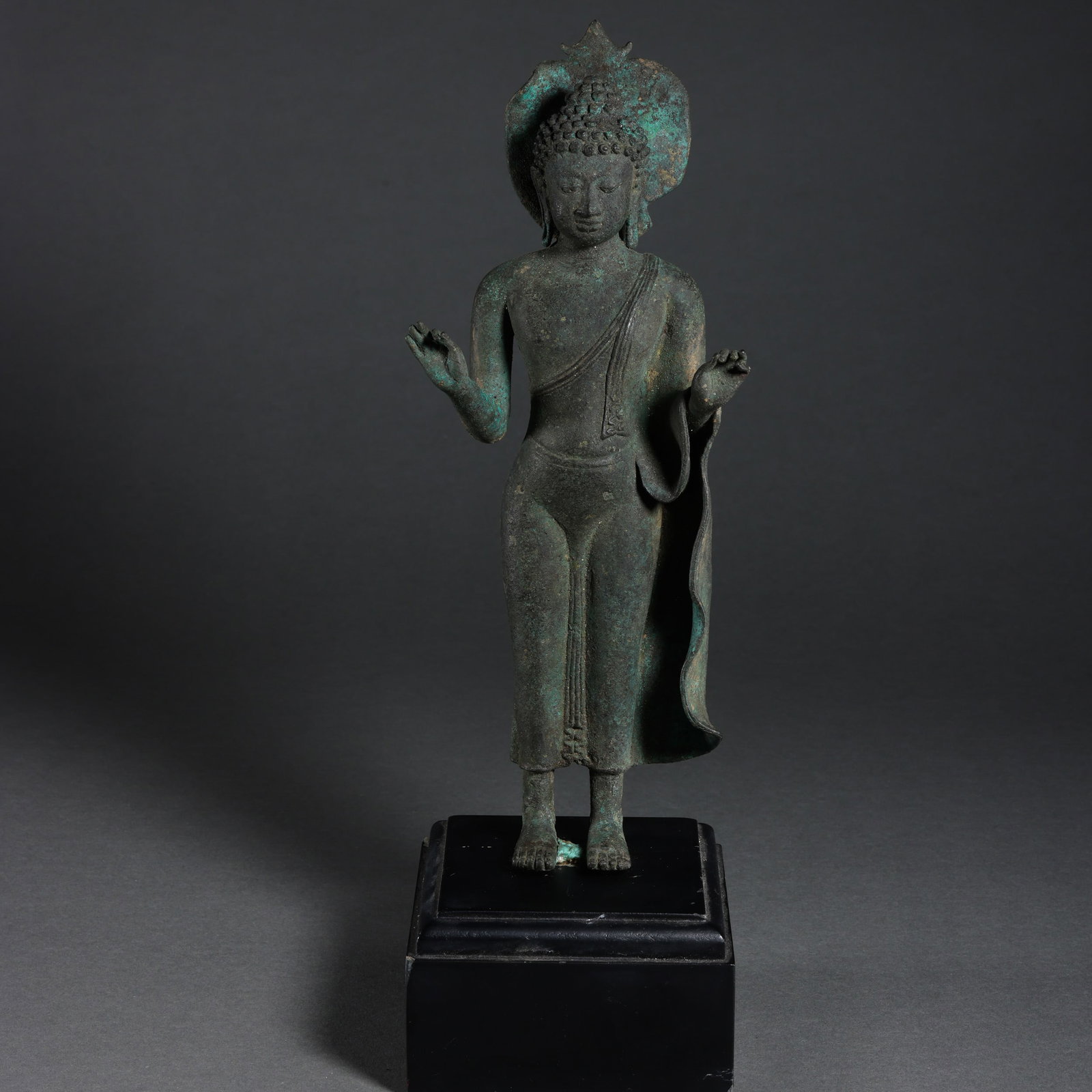 West Asian bronze standing Buddha statue: H . 31.7 cm . Weight 2410 gram .