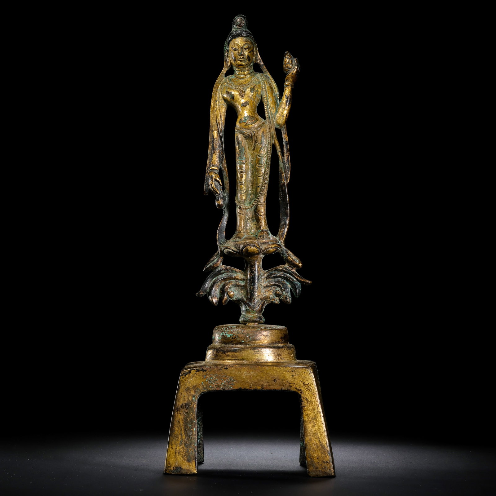 Gilt Bronze Standing Buddha Statue from the Northern Wei Dynasty of China: H . 29.5 cm . L . 10 cm . Weight 1191 gram .
