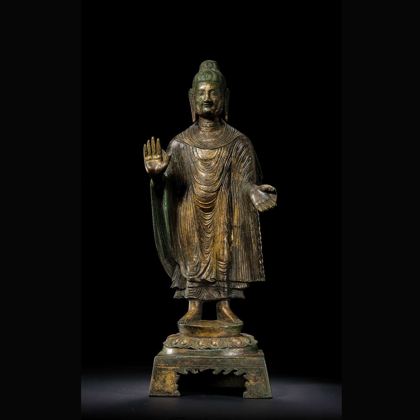 Gilt Bronze Standing Buddha Statue from the Northern Wei Dynasty in China: H . 41.5 cm . L . 16 cm . Weight 3392 gram .