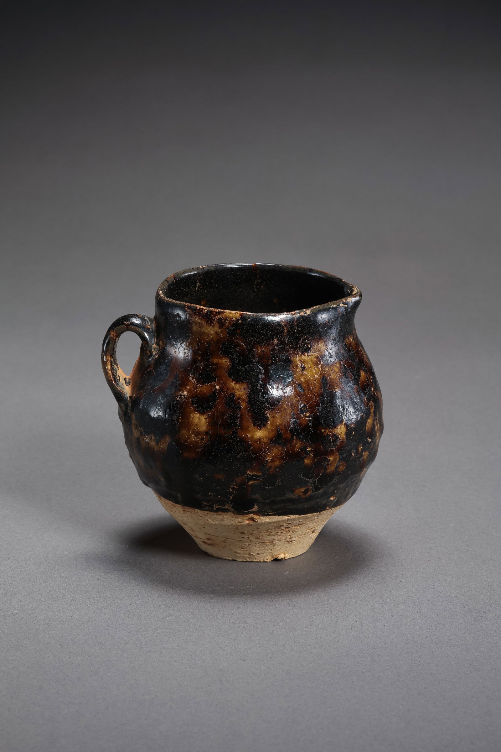 Tortoiseshell Glazed Pot from Jizhou Kiln, Southern Song Dynasty, China: H. 9 cm. W. 9 cm.