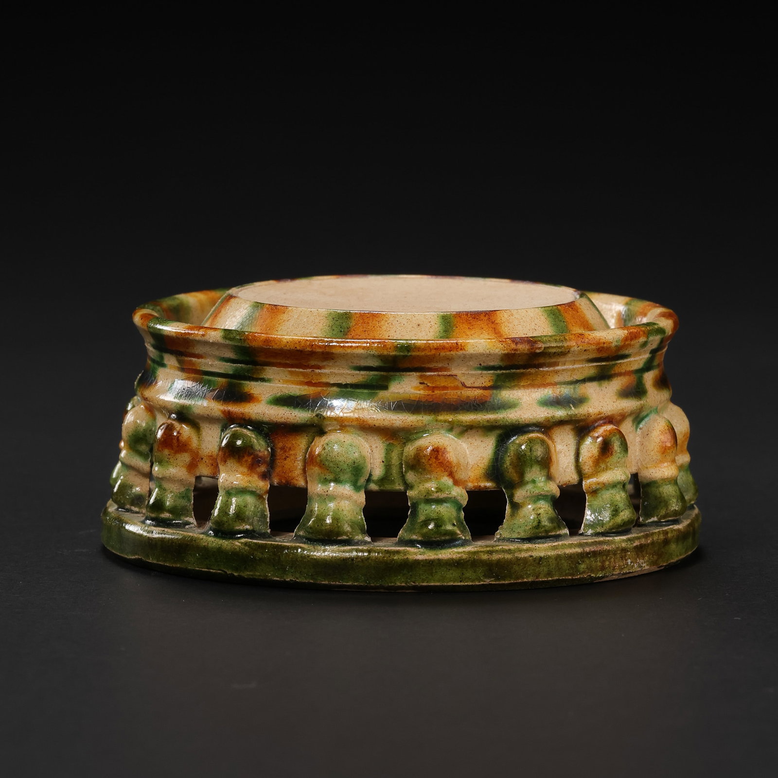 Chinese Tang Dynasty Tricolor Glazed Biyong Inkstone: H. 3 cm. W. 6.8 cm.