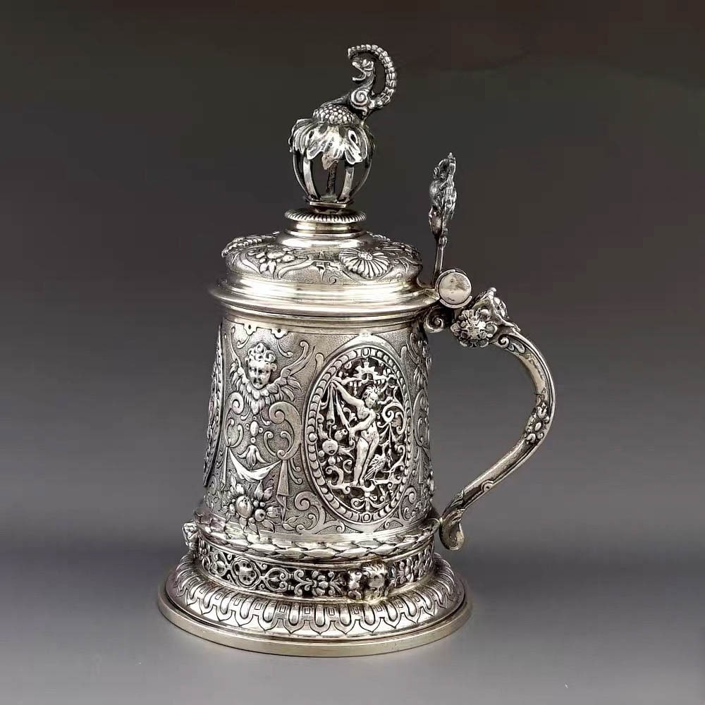 German Cellini?style Sterling Silver Beer Tankard;: German Cellini?style Sterling Silver Beer Tankard; weight: 480.6?g; height approx. 19.6?cm, base diameter approx. 11?cm.The term “sterling silver” herein refers to solid non?plated silver and