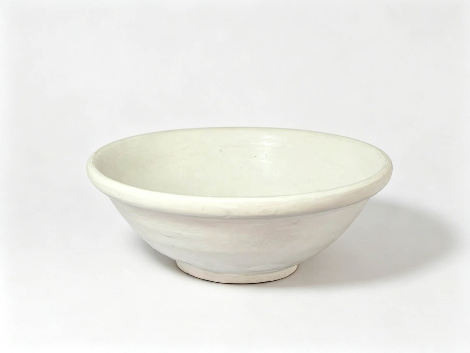 Xing Kiln Fine White-Glazed Wide Lipped Conical Cup, Late Tang to Five Dynasties Period: It is fully intact without any damage, featuring a compact and delicate form; small-sized examples of this type are quite scarce?Xing Kiln Fine White-Glazed Wide Lipped Conical Cup, Late Tang to Five
