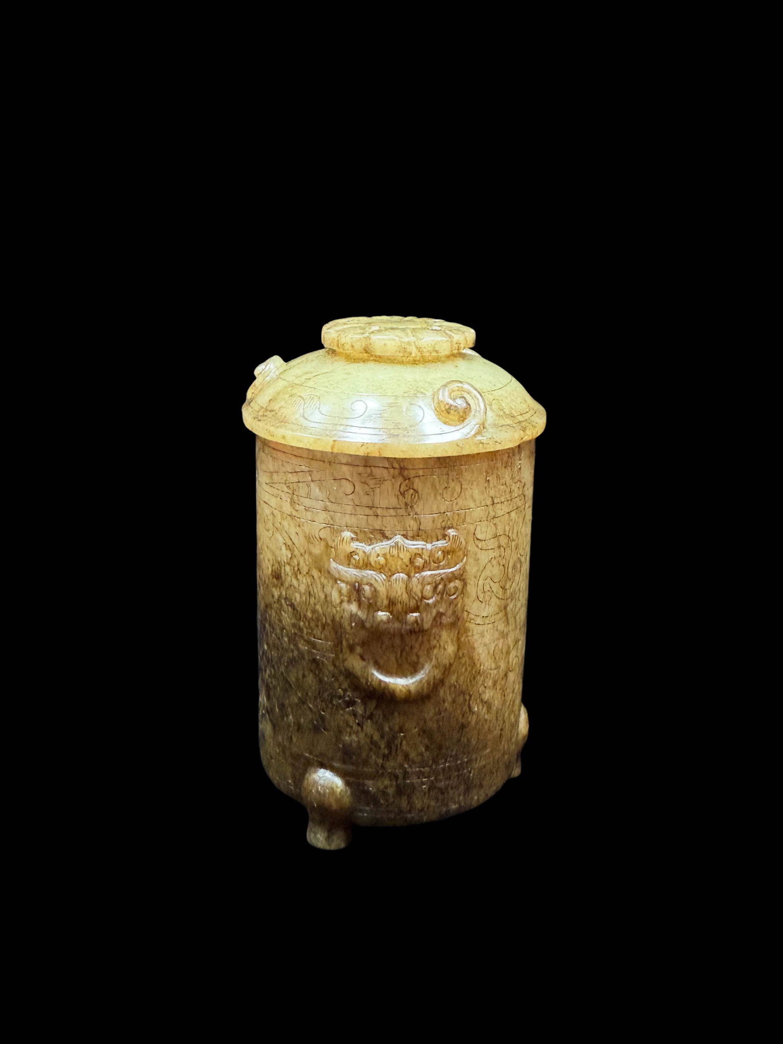 Jade Covered Zhi?Vessel with Beast?Mask Taotie Handles and Three Feet: Jade Covered Zhi?Vessel with Beast?Mask Taotie Handles and Three FeetProposed Period: Han DynastyBasic ArchiveDimensions: Width 6.4?cm (2.52?in), Height 10.6?cm (4.17?in); Weight 307?gCondition: