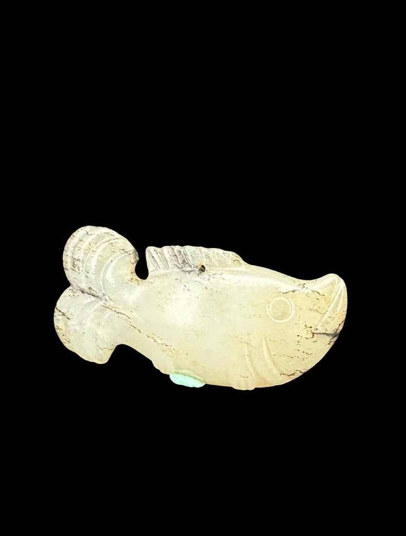 Jade Fish Pendant: Jade Fish PendantProposed Period: Song DynastyBasic ArchiveDimensions: Length 2.52 in, Width 0.50 in, Height 1.18 in; Weight 30?gCondition: No fractures, no stress cracks, no later repairs. The
