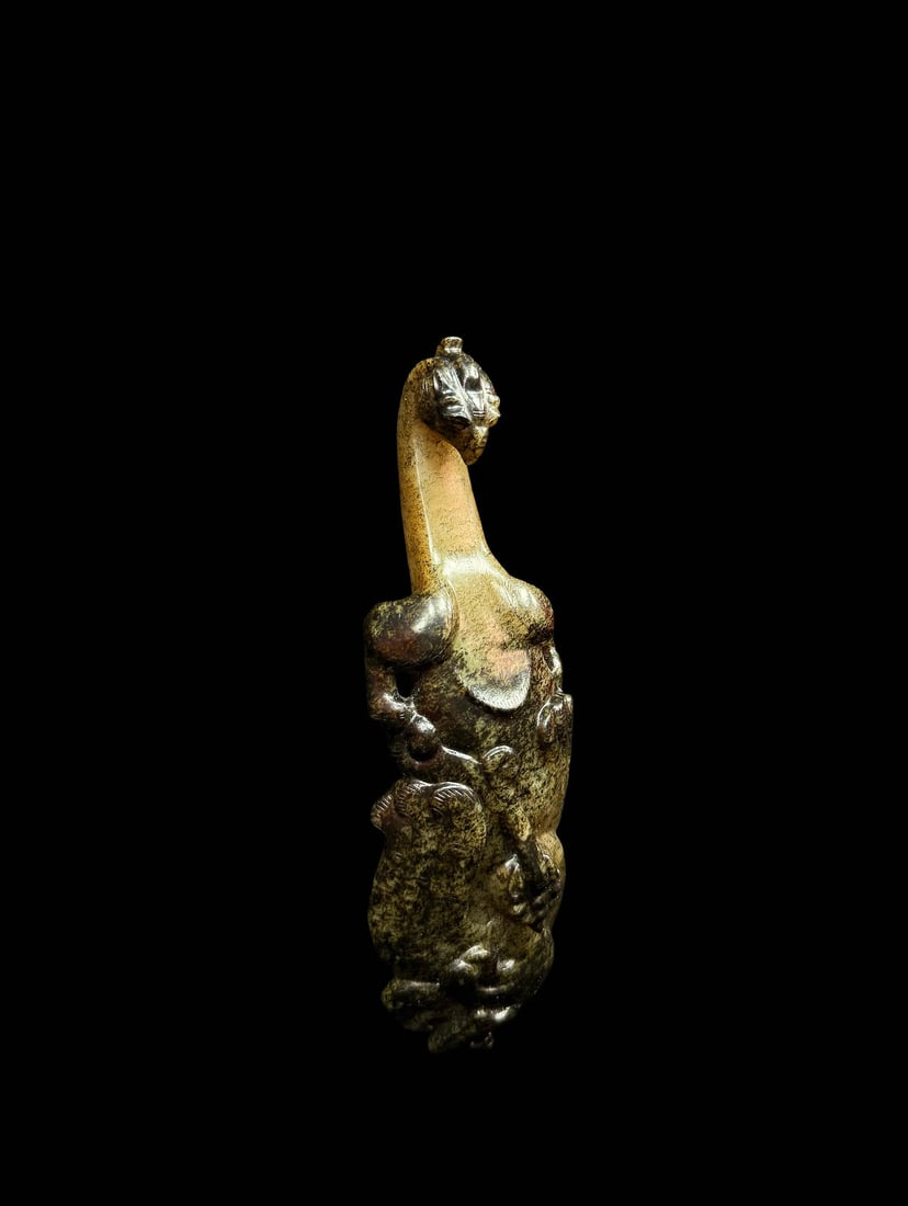 Jade Belt?Hook with Dragon?Chilong Motifs: Jade Belt?Hook with Dragon?Chilong MotifsProposed Period: Han DynastyBasic ArchiveDimensions: Width 2.09 in, Thickness 1.34 in, Length 6.93 in; Weight 275?gCondition: No fractures, no crack?lines, no