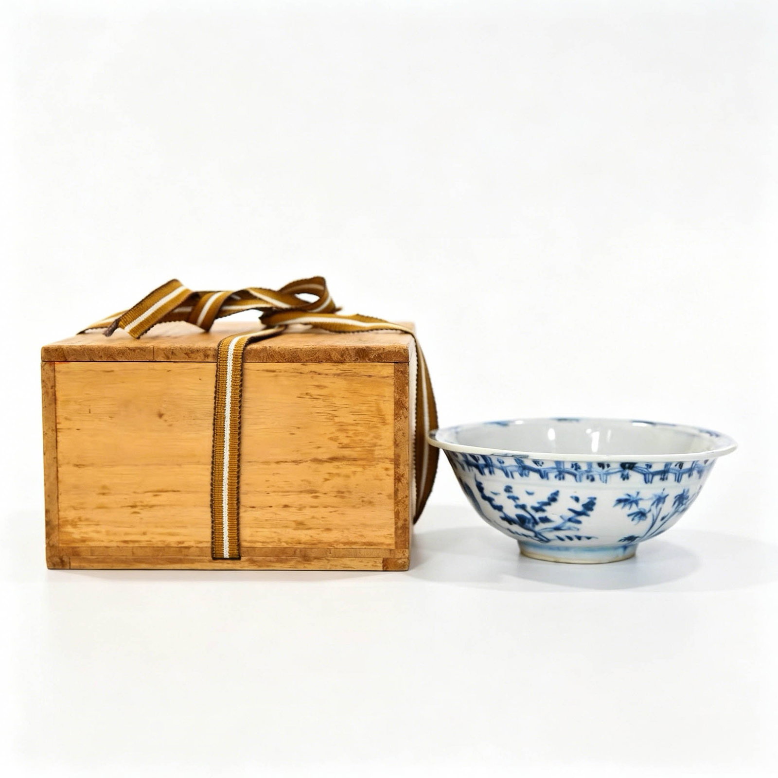 Chenghua Period Ming Dynasty Blue and White Bowl with Rock, Pine, Bamboo and Plum Blossom Motifs: Period: Chenghua Reign, Ming DynastyKiln: Jingdezhen Folk KilnVessel Form: Flared-mouth shallow bowl, dual-purpose literati tea bowl and decorative display bowlCondition: Perfect intact piece, free