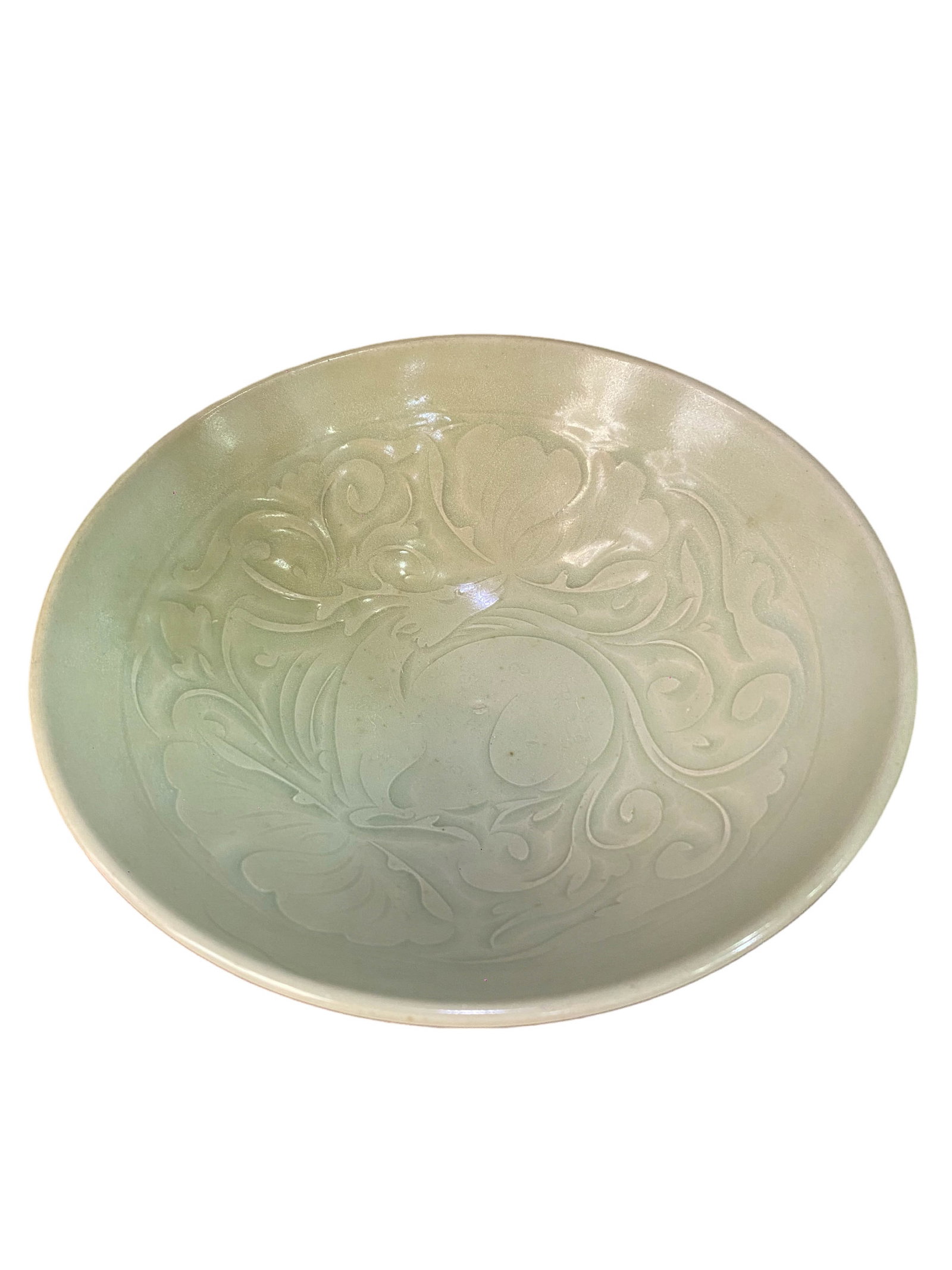 Yaozhou Kiln Celadon Large Bowl with Carved Mythical?Beast and Interlocking?Floral Decoration: Yaozhou Kiln Celadon Large Bowl with Carved Mythical?Beast and Interlocking?Floral DecorationSuggested Period: Jin DynastyBasic ArchiveDimensions: Diameter 7.09 in, Height 2.56 inCondition: No