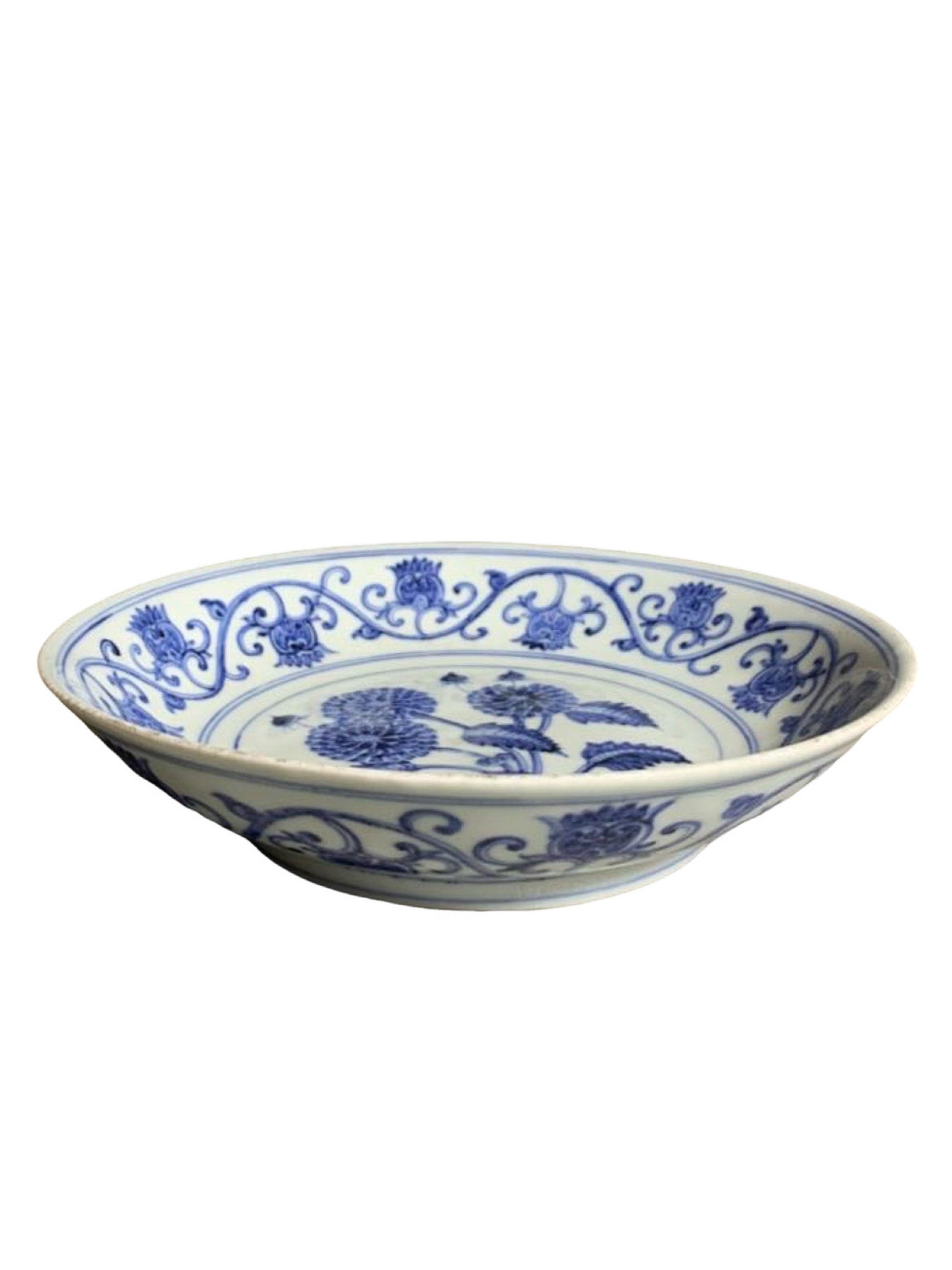 Blue and White Chrysanthemum?Pattern Dish, bearing Xuande reign mark: Blue and White Chrysanthemum?Pattern Dish, bearing Xuande reign markSuggested Period: Qing Dynasty, after Xuande prototypeBasic ArchiveDimensions: Height 1.89 in, Diameter 8.66 inMark: