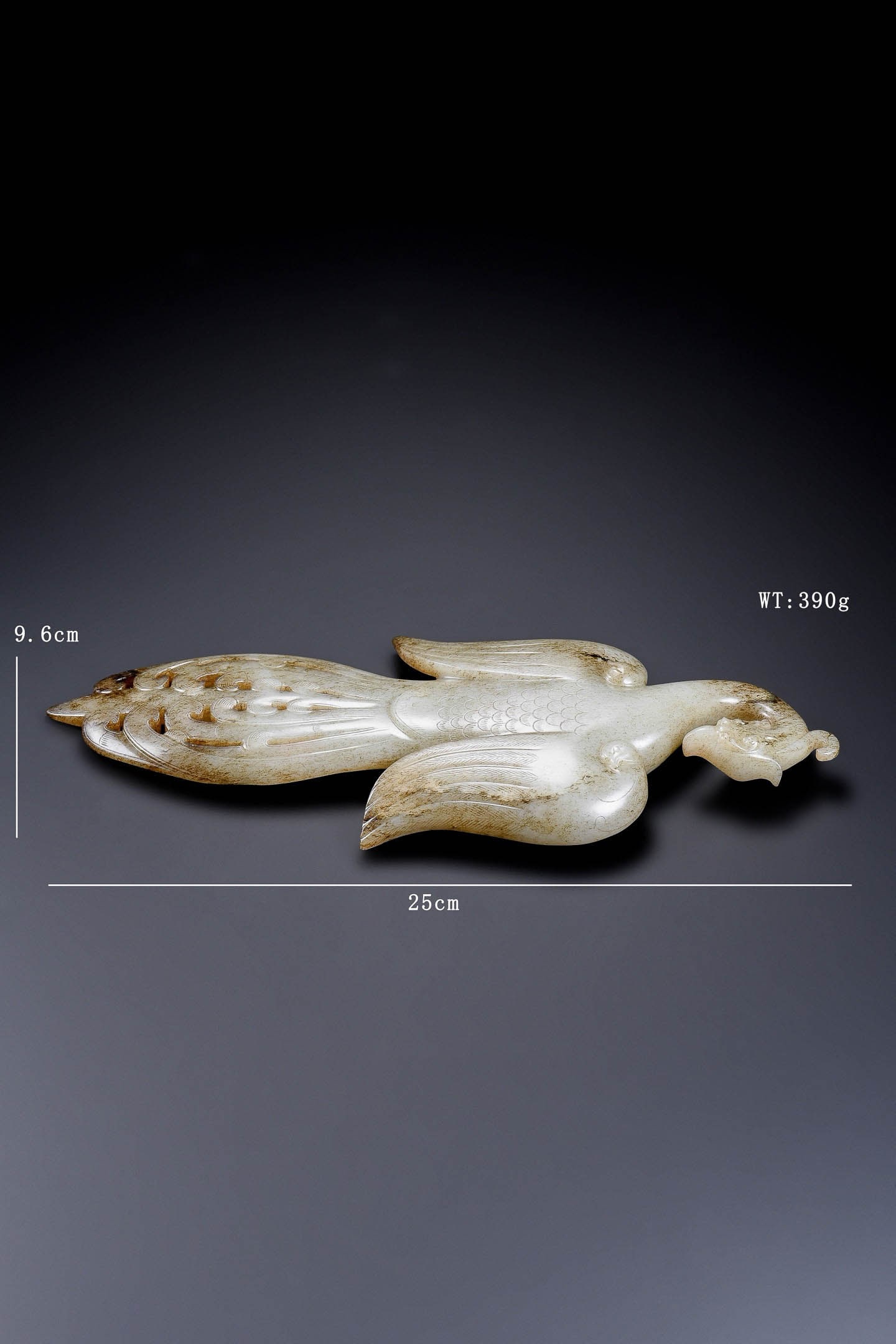 White?Jade Large Phoenix Ornament: White?Jade Large Phoenix OrnamentSuggested Period: Tang DynastyBasic ArchiveDimensions: Length 25?cm (9.84?in), Width 9.6?cm (3.78?in); Weight 390?gCondition: Carved from a single block of jade; no