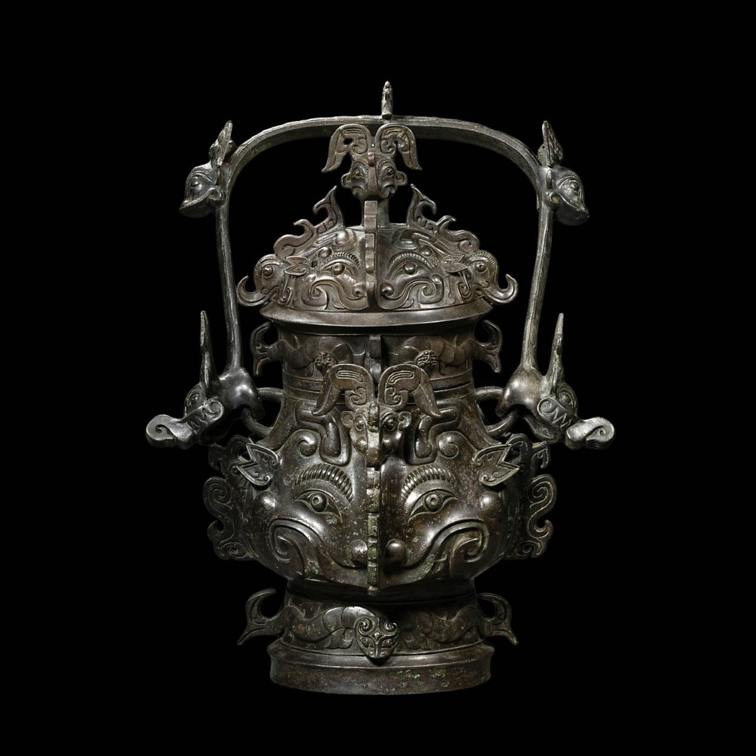 Bronze You Wine Vessel with Animal?Mask Motif: Suggested Period: Western Zhou DynastyDimensions: Height 19.29?inches
