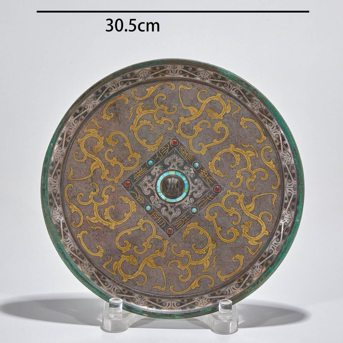 Bronze Mirror with Gold?and?Silver Inlay, Gem?Inlaid Inscriptions and Chilong?Dragon: Bronze Mirror with Gold?and?Silver Inlay, Gem?Inlaid Inscriptions and Chilong?Dragon PatternsDating Suggestion: Warring States PeriodDimensions: Diameter 30.5?cm (12.01?inches)Condition: Cast?molded i
