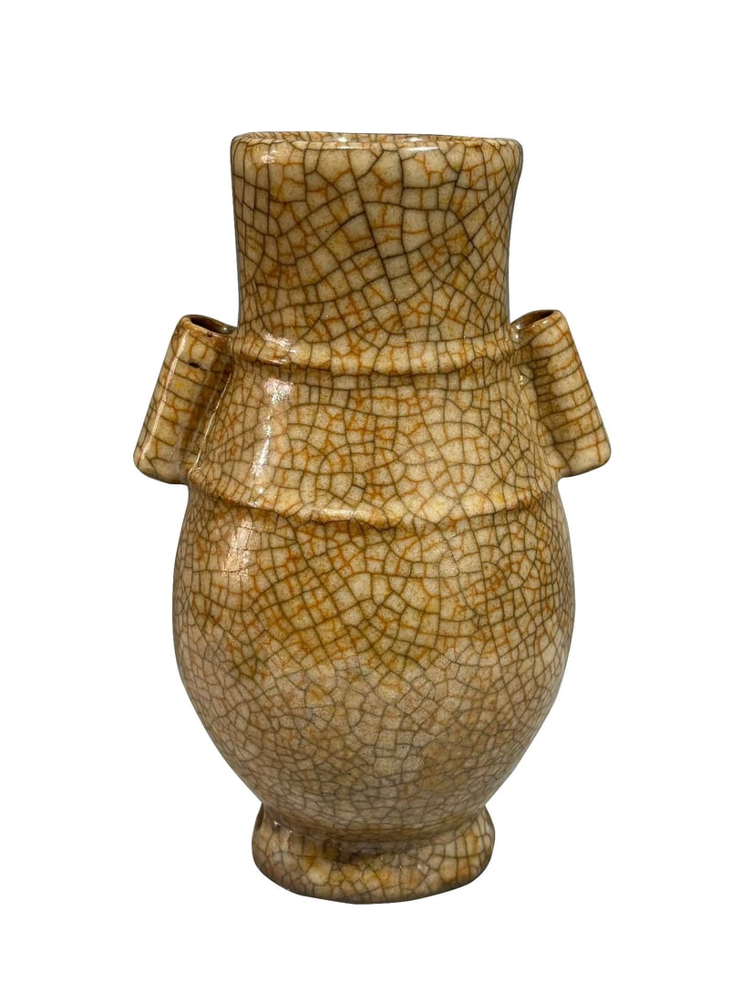 Ge?type Beige?Glazed Vase with Tubular Handles: Ge?type Beige?Glazed Vase with Tubular HandlesSuggested Period: Yuan?Ming Dynasty, Ge?yao wareDimensions: Height 21.8?cm (8.58 in), Maximum Belly Diameter 12.5?cm (4.92 in)Object DescriptionMaterial