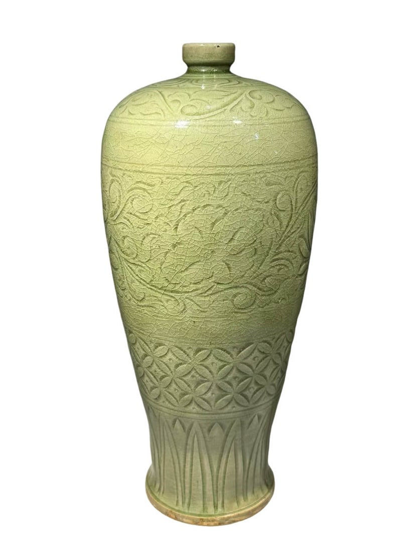 Longquan Celadon Carved Multi?layered Pattern Meiping Vase: Longquan Celadon Carved Multi?layered Pattern Meiping VaseSuggested Period: Yuan Dynasty, Longquan Kiln GroupDimensions: Height 14.57 in, Maximum Belly Diameter 5.31 inObject DescriptionMaterial and