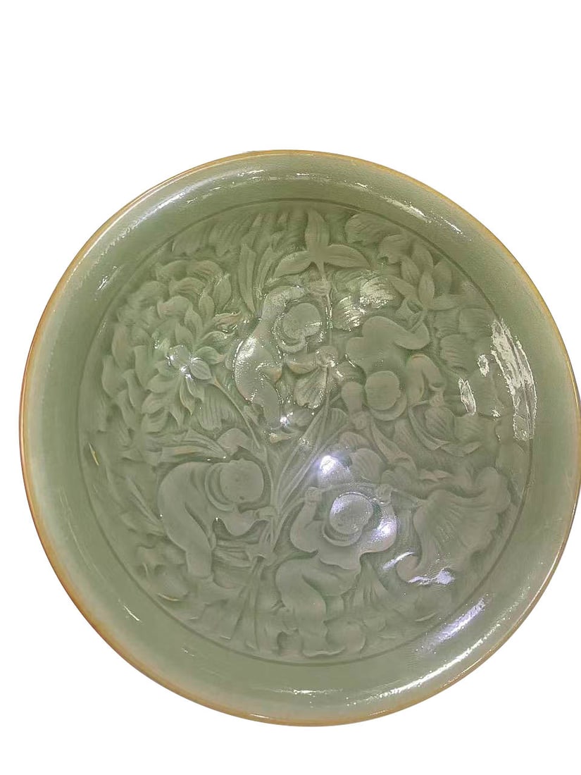 Celadon Shallow Bowl with Incised Boys?at?Play and Floral Decoration: Celadon Shallow Bowl with Incised Boys?at?Play and Floral DecorationSuggested Period: Yuan Dynasty, Longquan Kiln GroupDimensions: Diameter 6.10 in, Height 1.65 inObject DescriptionMaterial and