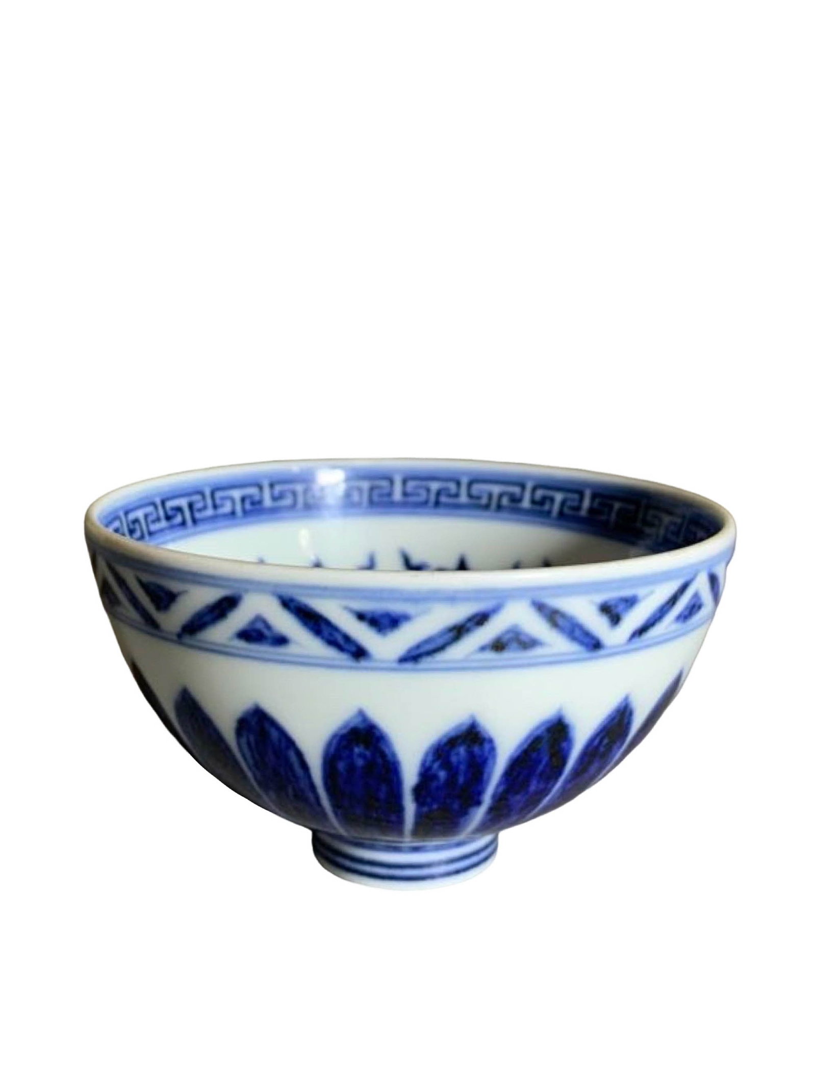 Small Blue?and?White Bowl with Chrysanthemum?Petal Motifs: Small Blue?and?White Bowl with Chrysanthemum?Petal MotifsSuggested Period: In the style of Yongle, Ming DynastyDimensions: Height 2.17 in, Diameter 3.74 inWeight: Not weighedObject DescriptionForm
