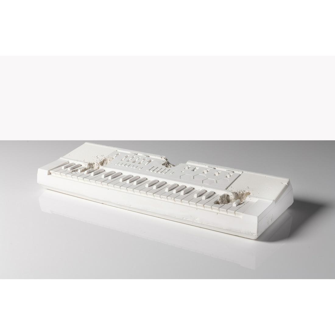 Daniel Arsham (born 1980): Daniel Arsham (born 1980) Keyboard, Future relic 09 2018 Sculpture Plaster keyboard and molded broken glass, with a pair of gloves in its paper cover, and in its original box n. 103/500 on the label A