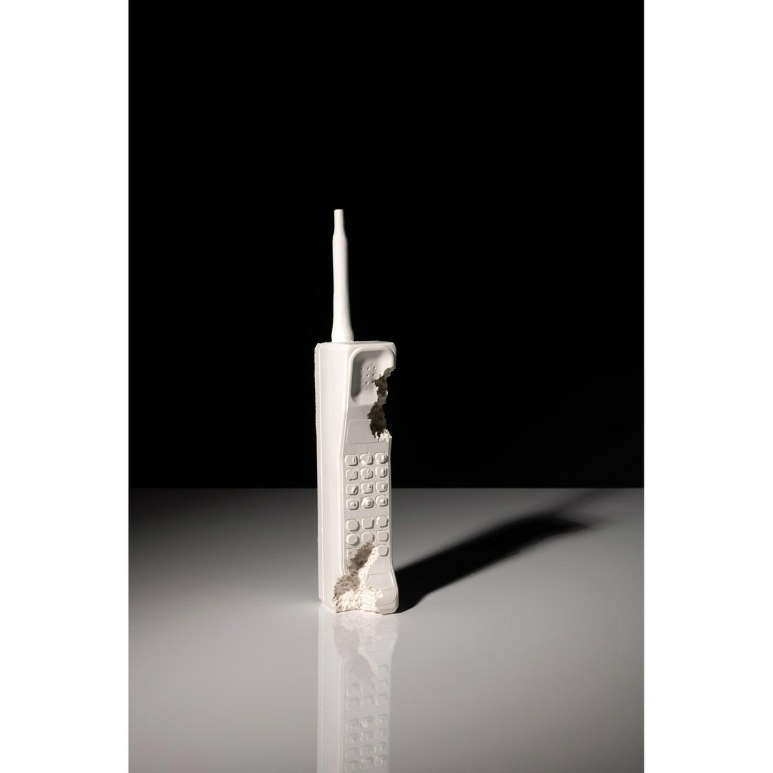 Daniel Arsham (born 1980): Daniel Arsham (born 1980) Mobile Phone, Future Relic DAFR 01 2013 Sculpture Mobile phone in plaster and molded broken glass, with a pair of gloves in its plastic cover under the lid, and in its origin