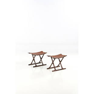 Ole Wanscher (1903-1985) Model no. PJ 2000, Egyptian: Ole Wanscher (1903-1985) Model no. PJ 2000, Egyptian Pair of folding stools Rosewood and leather A.J. Iversen Edition Creation date: circa 1957 H 41 ×L 54,5×P 31 cm Bibliography: Grete Jalk