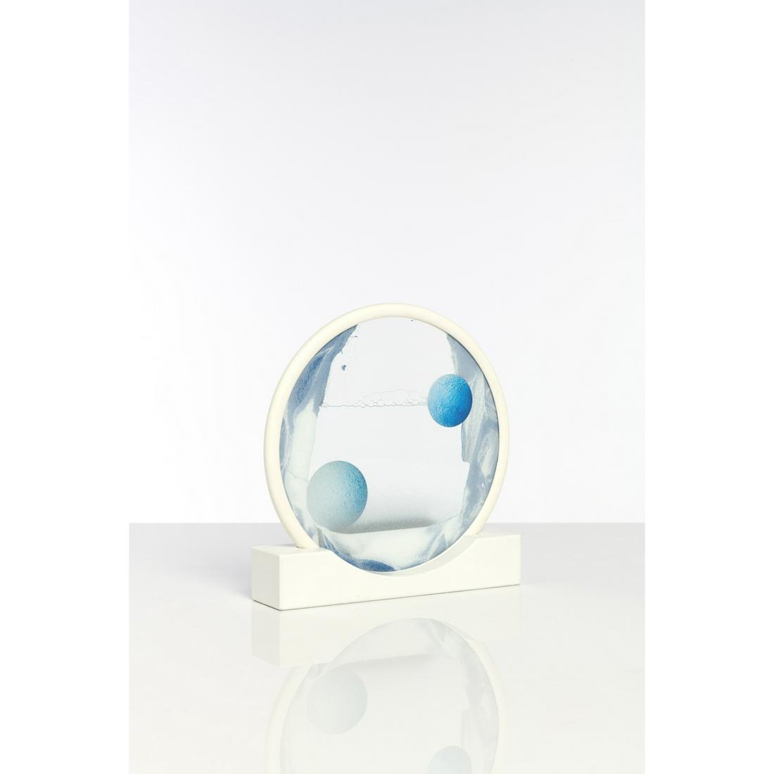 Daniel Arsham (born 1980) Sand circle - 2017 Glass and: Daniel Arsham (born 1980) Sand circle - 2017 Glass and wood sculpture containing tinted sand and presented on its stand Bears a label numbered 101/500 beneath the stand. Presented in its original box,