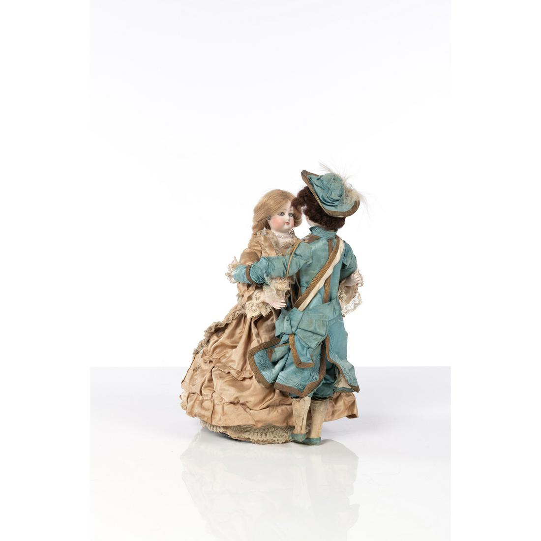 A GUSTAVE VICHY COUPLE OF WALTZ-DANCE AUTOMATON, circa: A GUSTAVE VICHY COUPLE OF WALTZ-DANCE AUTOMATON, circa 1875/1880 The female dancer with a biscuit arms and head with close mouth of François Gaultier. The man dancer with a biscuit head with clos