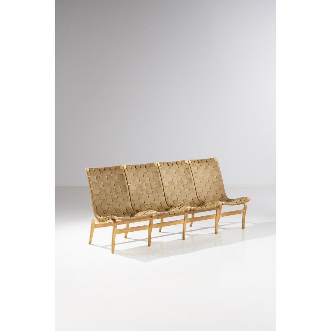 Bruno Mathsson (1907-1988) Eva: Bruno Mathsson (1907-1988)EvaSofaBeechwood and toileSigned 'Bruno Mathsson, Design, Made in Sweden'Creation date: circa 1970H 83 x L 196 x P 67 cm