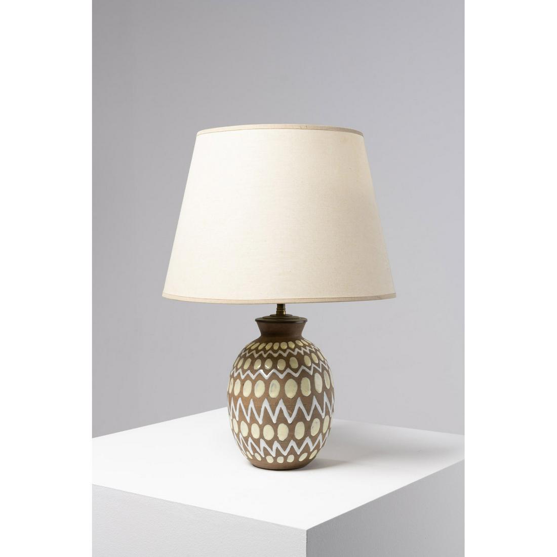 Jean Besnard (1889-1958) Table lamp: Jean Besnard (1889-1958)Table lampGlazed stoneware and fabricIncised signature, 'JB' on the reverseCreation date: circa 1935Lamp foot: H 23 × Ø 14 cmLampshade: H 25 × Ø 36 cm