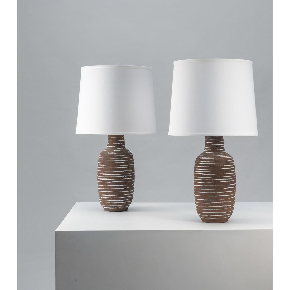 Lee Rosen (20th c.) for Design Technics (20th c.) Pair: Lee Rosen (20th c.) for Design Technics (20th c.)Pair of table lampsCeramic, brass and fabricCreation date: circa 1950H 78,5 × Ø 43 cm