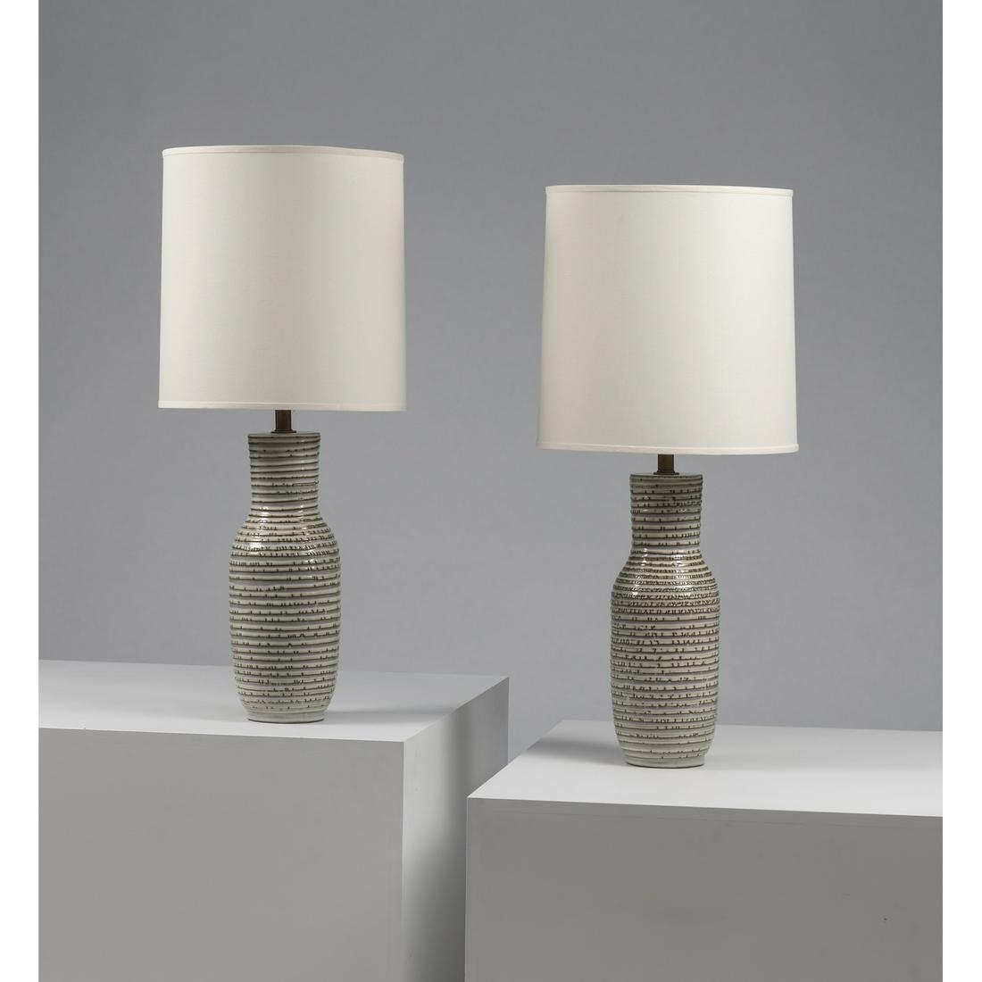 Lee Rosen (20th c.) for Design Technics (20th c.) Pair: Lee Rosen (20th c.) for Design Technics (20th c.)Pair of table lampsCeramic, brass and fabricCreation date: circa 1950H 92 × Ø 40,5 cm