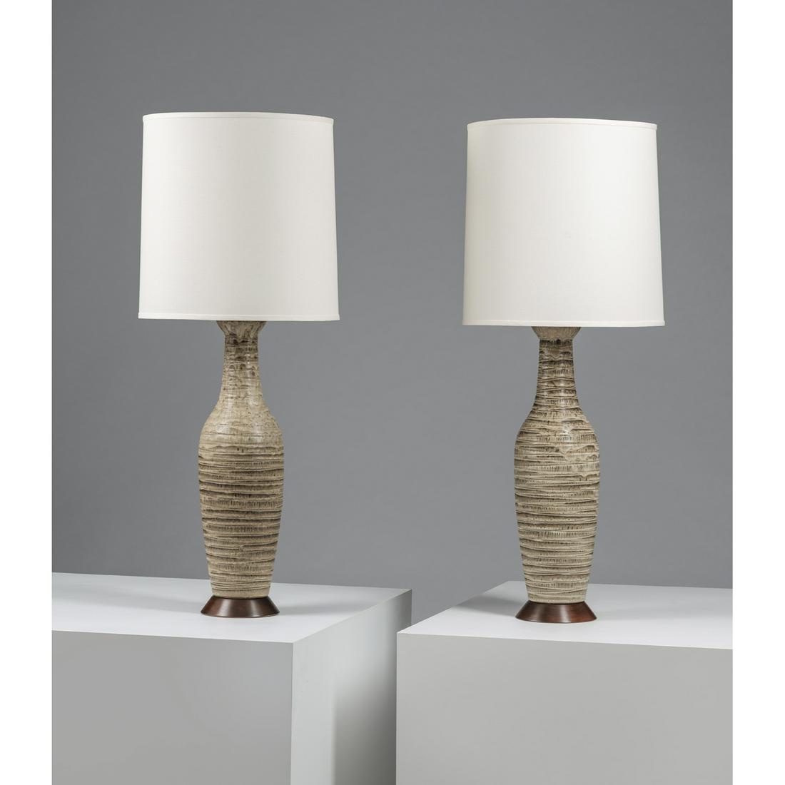 Lee Rosen (20th c.) for Design Technics (20th c.) Pair: Lee Rosen (20th c.) for Design Technics (20th c.)Pair of table lampsCeramic, brass, walnut and fabricCreation date: circa 1950H 103 × Ø 40,5 cm