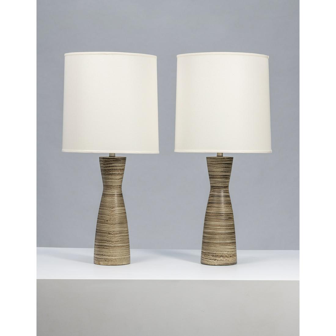 Lee Rosen (20th c.) for Design Technics (20th c.) Pair: Lee Rosen (20th c.) for Design Technics (20th c.)Pair of table lampsCeramic, brass and fabricCreation date: circa 1960H 89 × Ø 40,5 cm