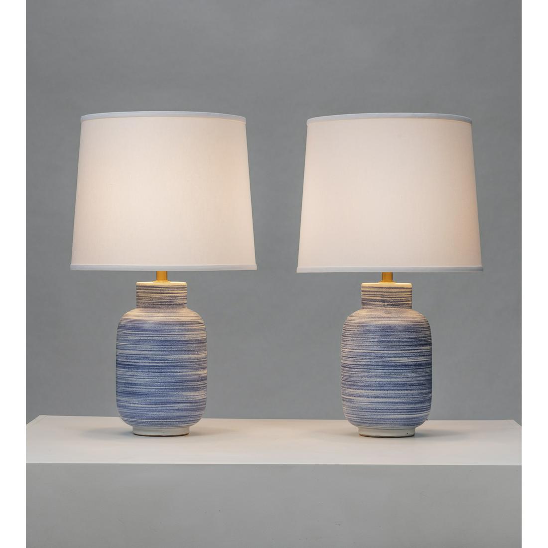 Lee Rosen (20th c.) for Design Technics (20th c.) Pair: Lee Rosen (20th c.) for Design Technics (20th c.)Pair of table lampsCeramic, brass and fabricCreation date: circa 1960H 76 × Ø 43 cm