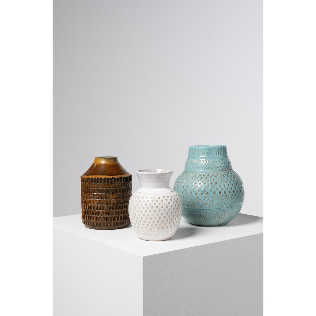 Jean Besnard (1889-1958) Set of three vases: Jean Besnard (1889-1958)Set of three vasesGlazed ceramicLargest signed 'Jean Besnard', the two others 'J.B'Models created circa 1930Largest: H 24 × Ø 21 cmSmallest: H 18 × Ø 14 cmB