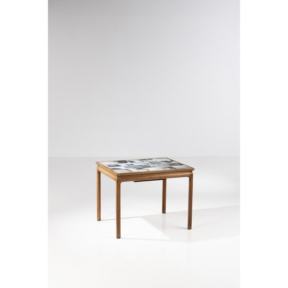 Frits Henningsen (1889-1965) Coffee table: Frits Henningsen (1889-1965)Coffee tableMahogany and glazed stonewareModel created circa 1930H 65 × L 84 × P 68,5 cmCeramic tiles produced by Kæhler and created by Jens Thirslund.