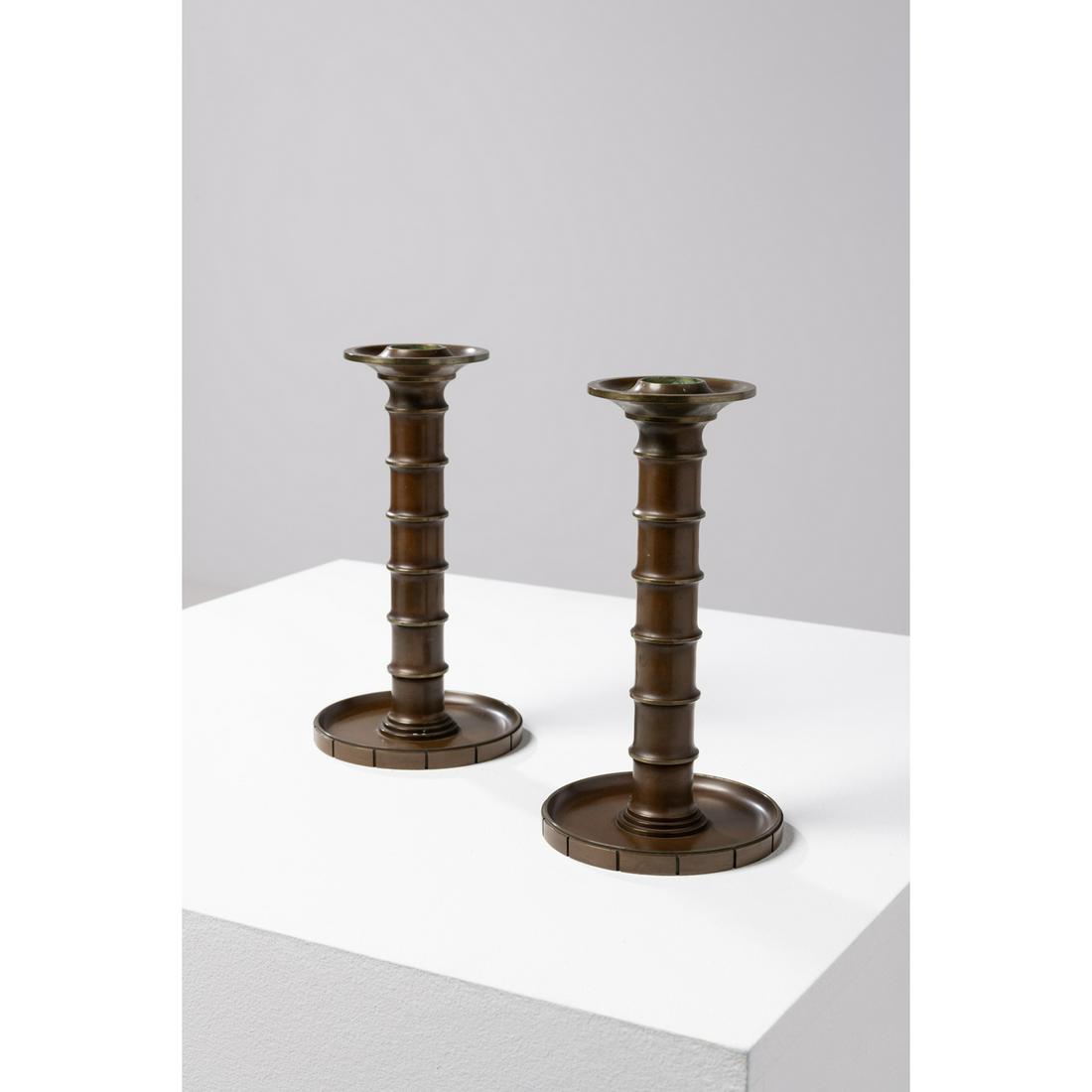 Evan Jensen (XX) Model no. 301: Evan Jensen (XX)Model no. 301Pair of candle holdersBronzeEdited by Evan JensenManufacturer's stamp 'EVAN JENSEN DENMARK' and numbered '301'Model created in 1929H 21 × Ø 11,5 cm